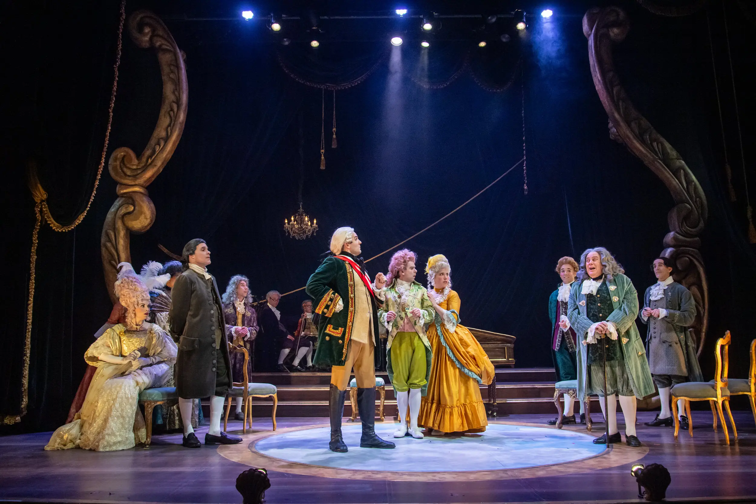 Multiple actors on stage for a performance of Amadeus