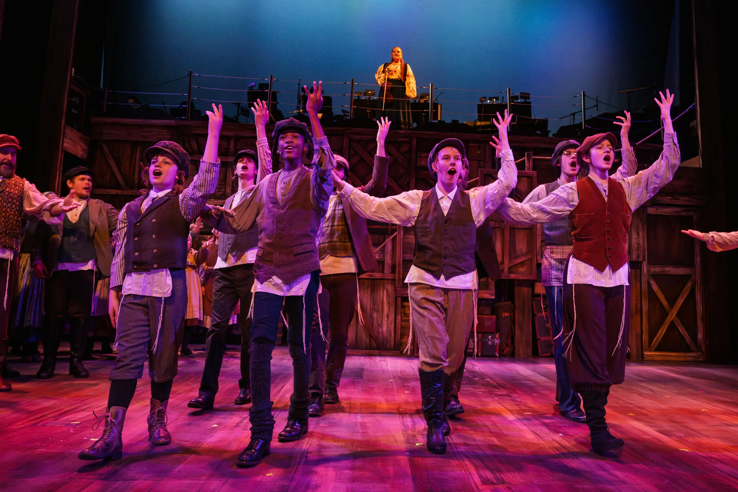 Actors signing for a Fiddler on the Roof Performance.