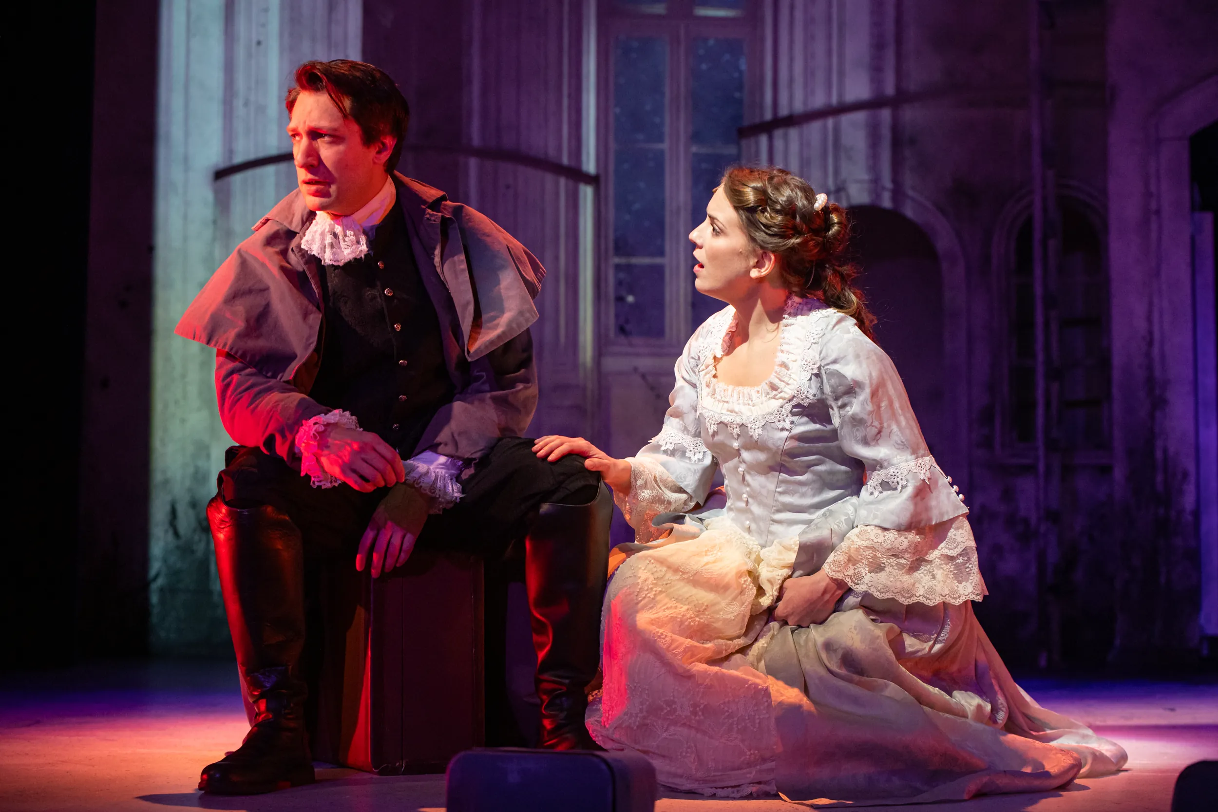 Two actors on stage singing during Frankenstein performance