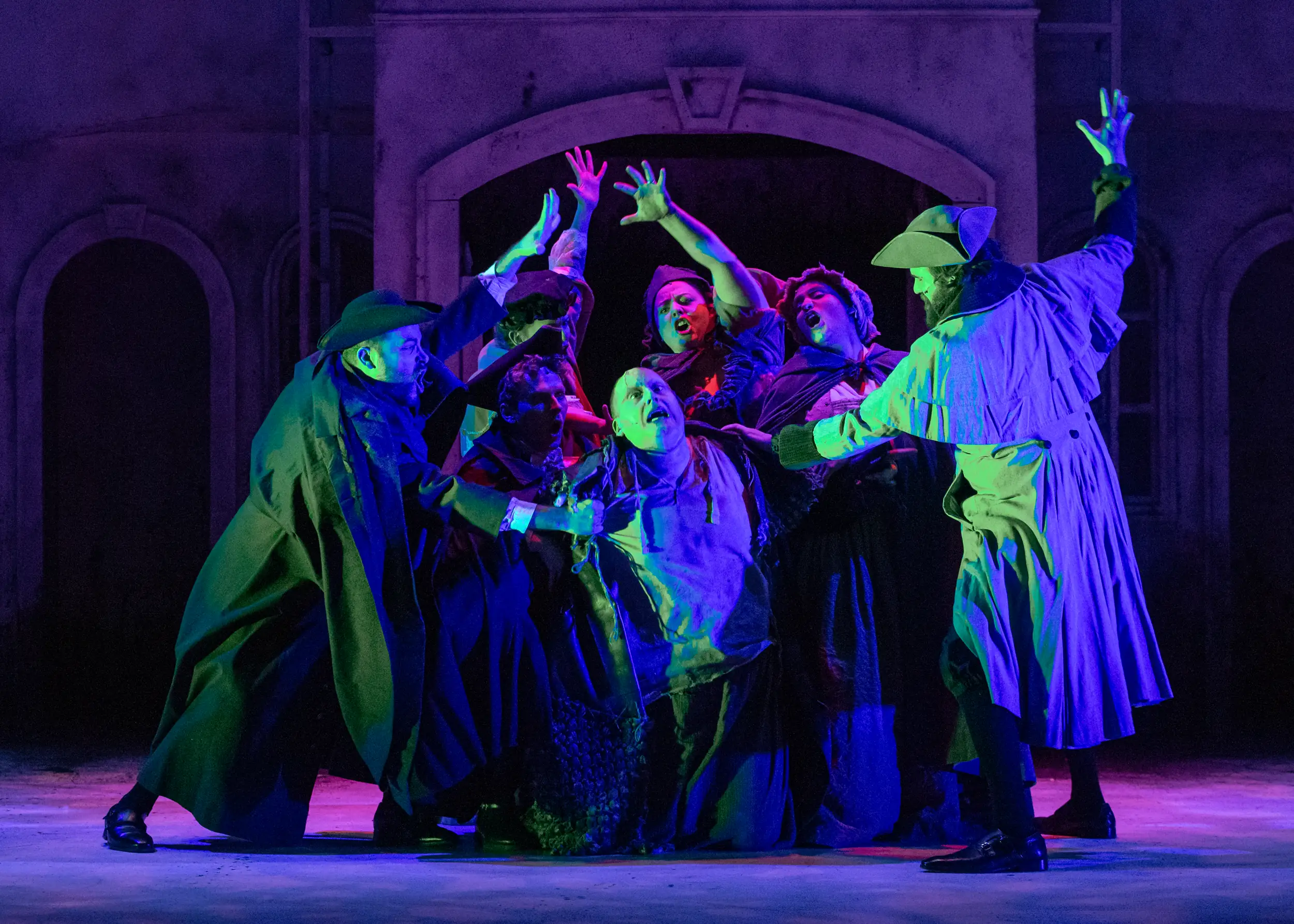 Actors on stage singing during Frankenstein performance