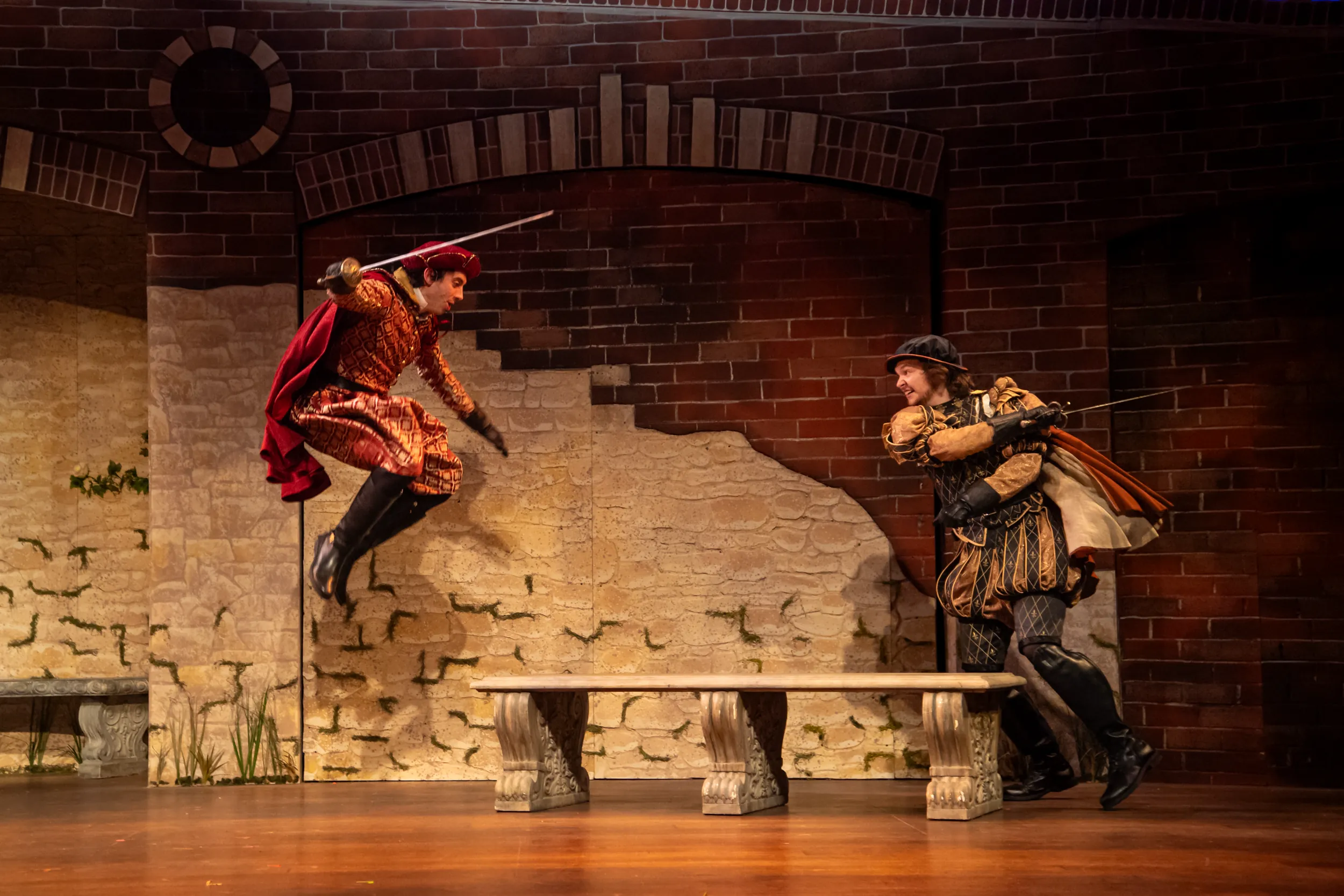 Two men sword fighting on stage during Juliet and Romeo performance?