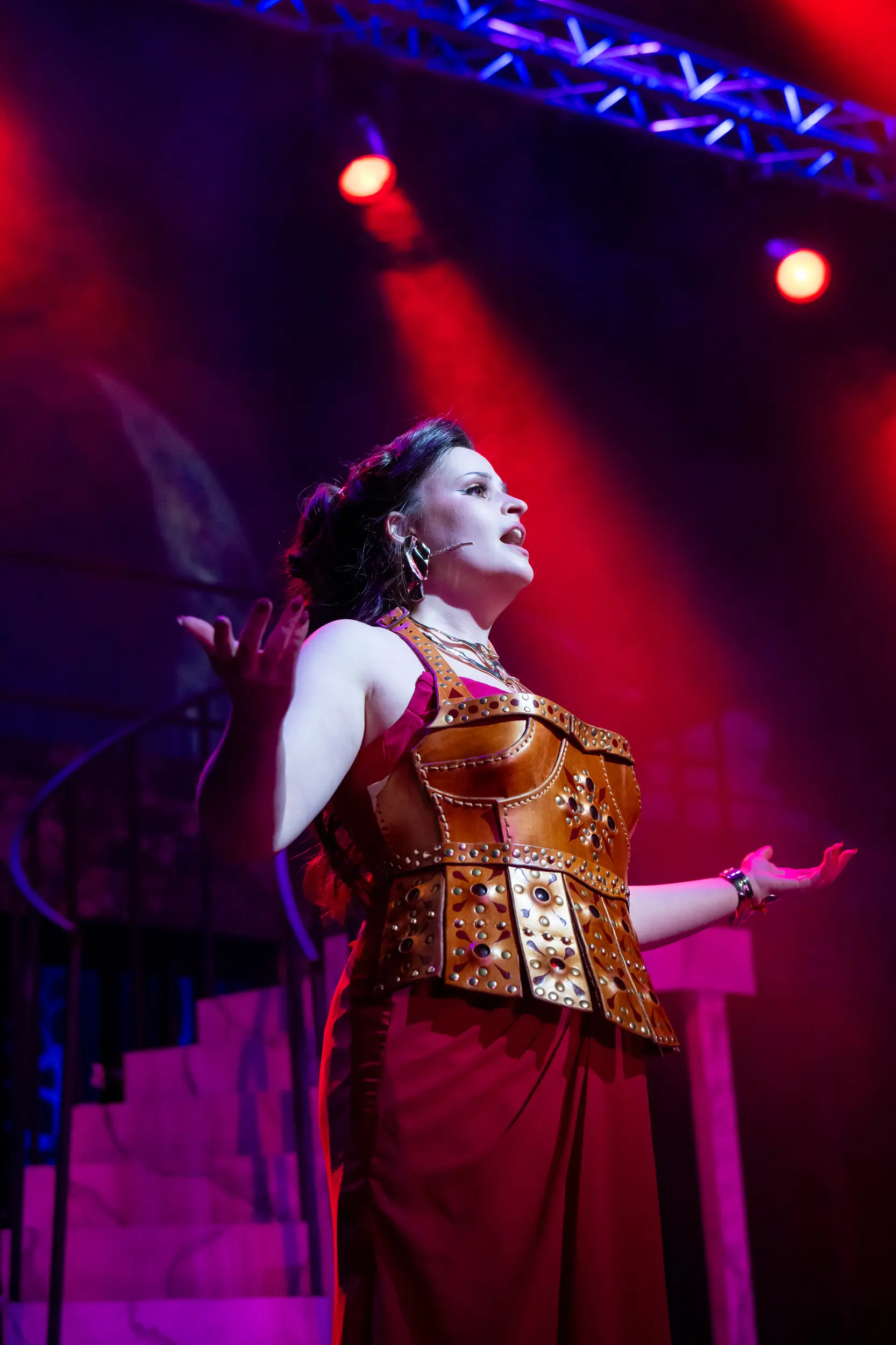 Woman singing solo as part of the Rockin Midsummer Nights Dream performance