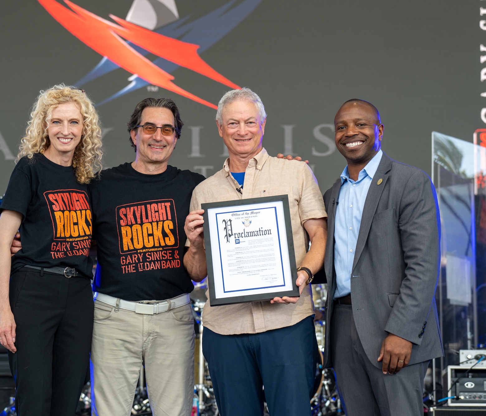 Susan Varela, Michael Unger, Gary Sinise, and Mayor Cavalier Johnson at Skylight Rocks