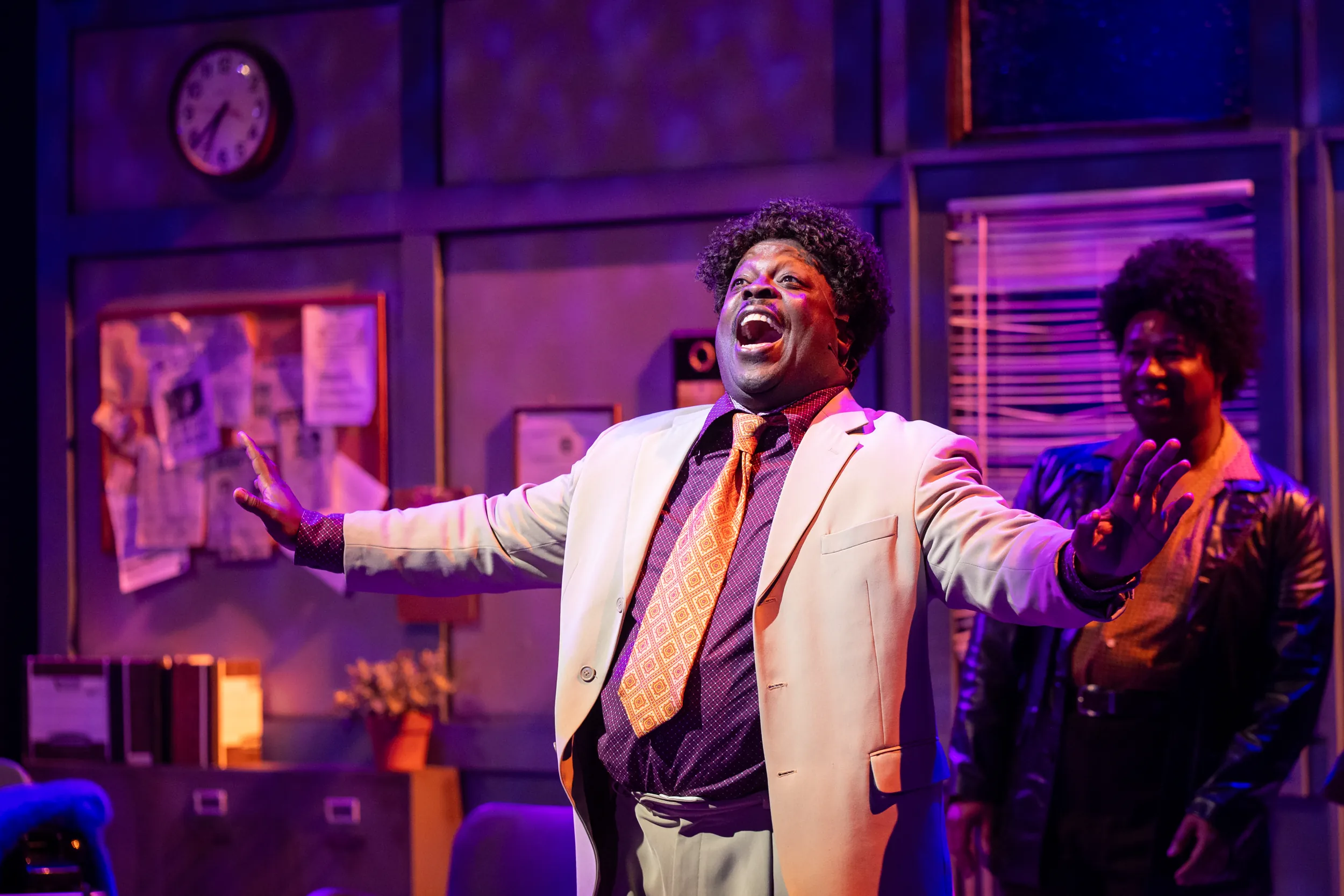 Singing man during Sister Act performance