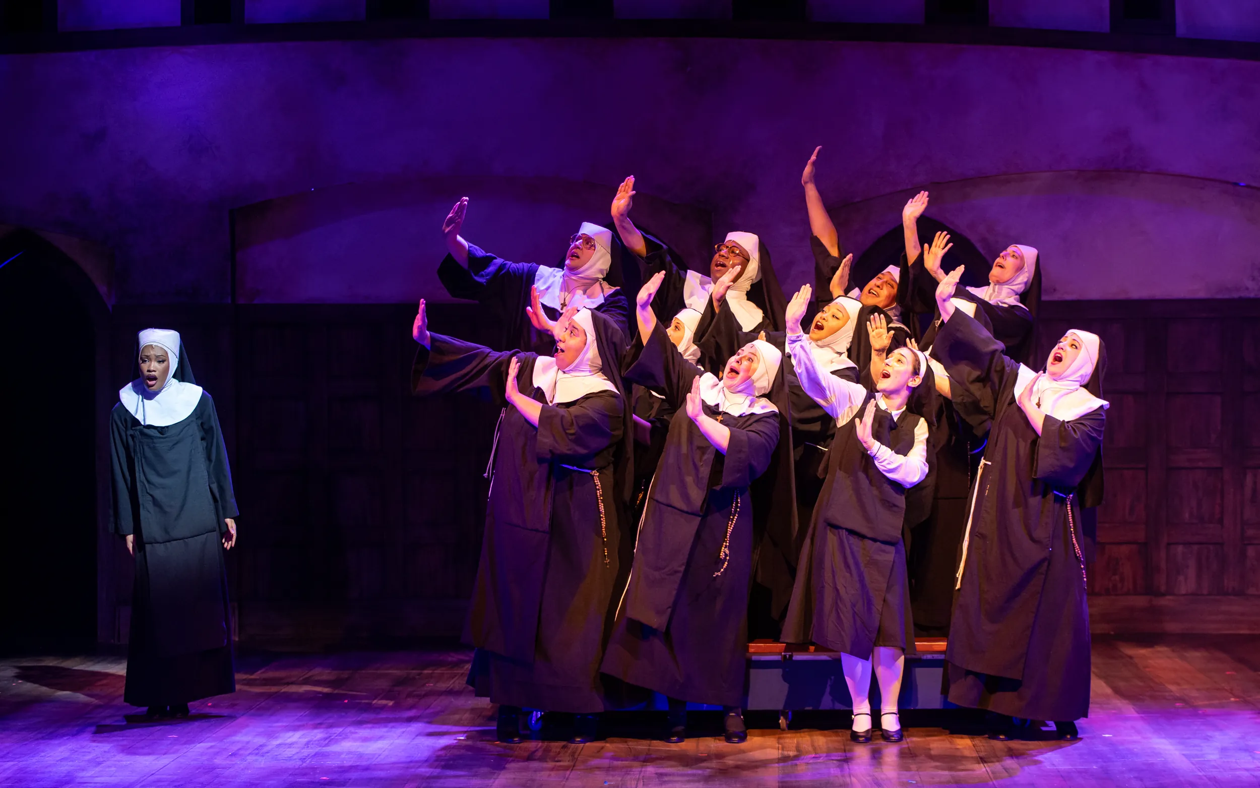 Nuns in a group singing for Sister Act Performance