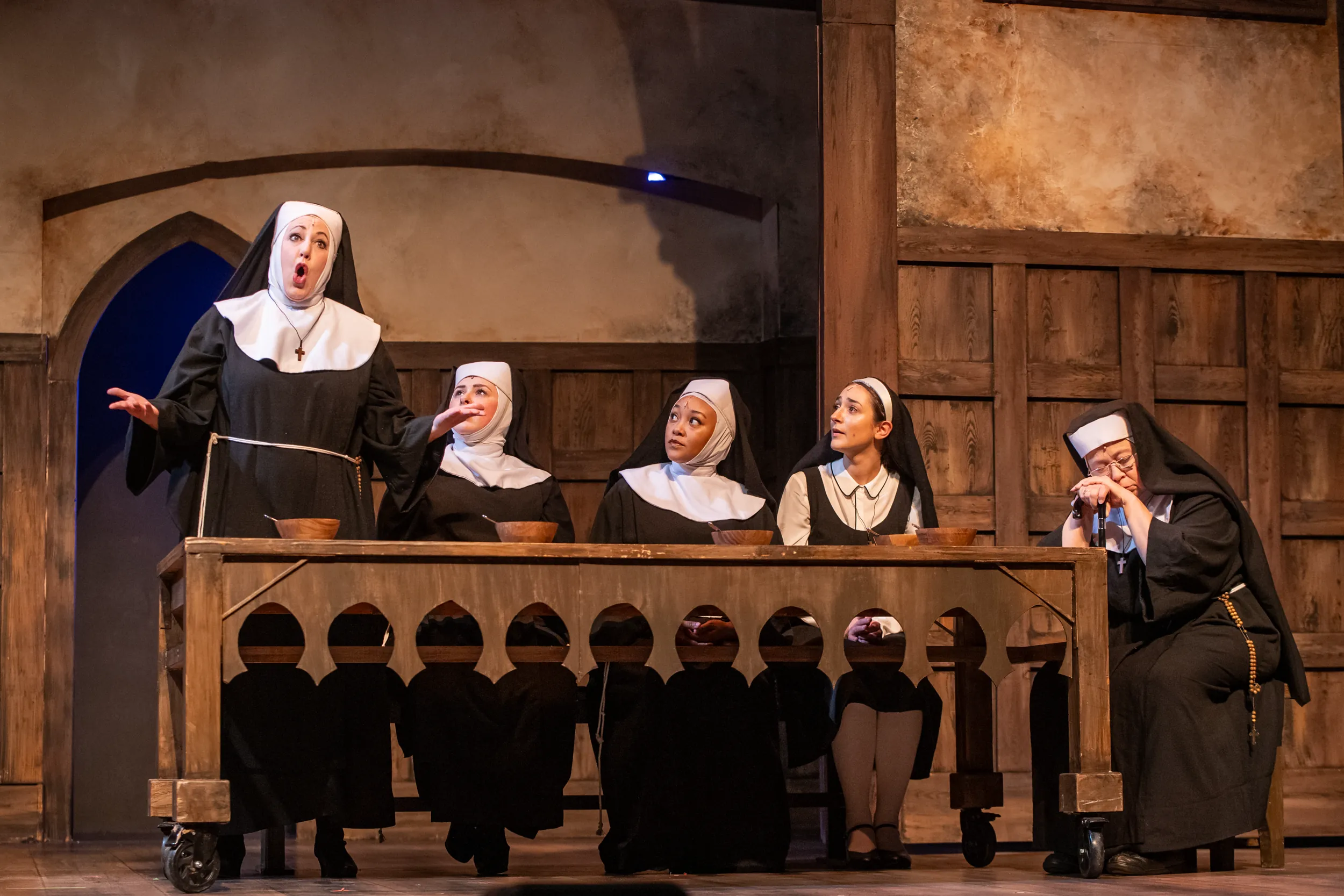 Sister act - nuns at a table during performance.