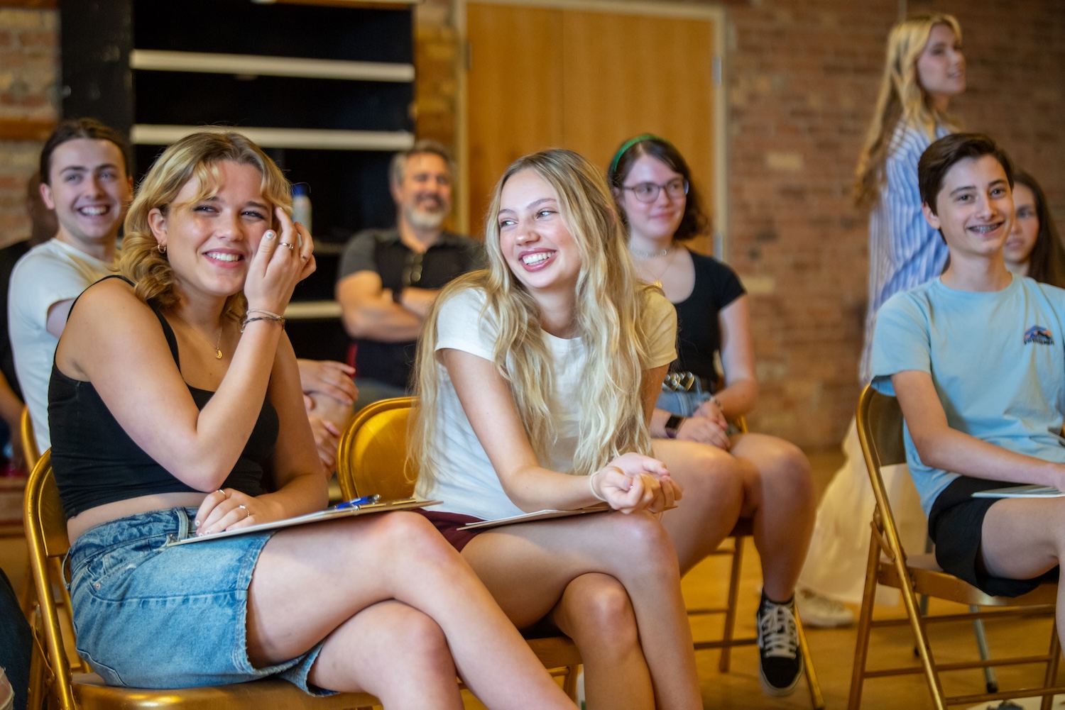 Students laughing in Skylight Summer Musical Theater Camp
