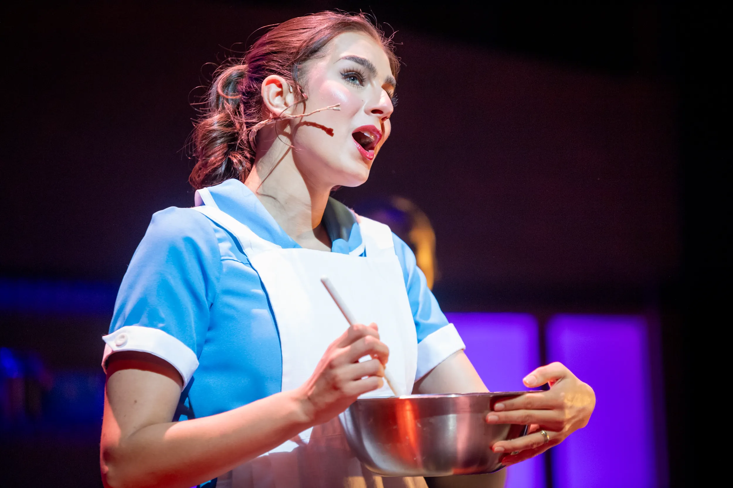 Woman solo during Waitress performance